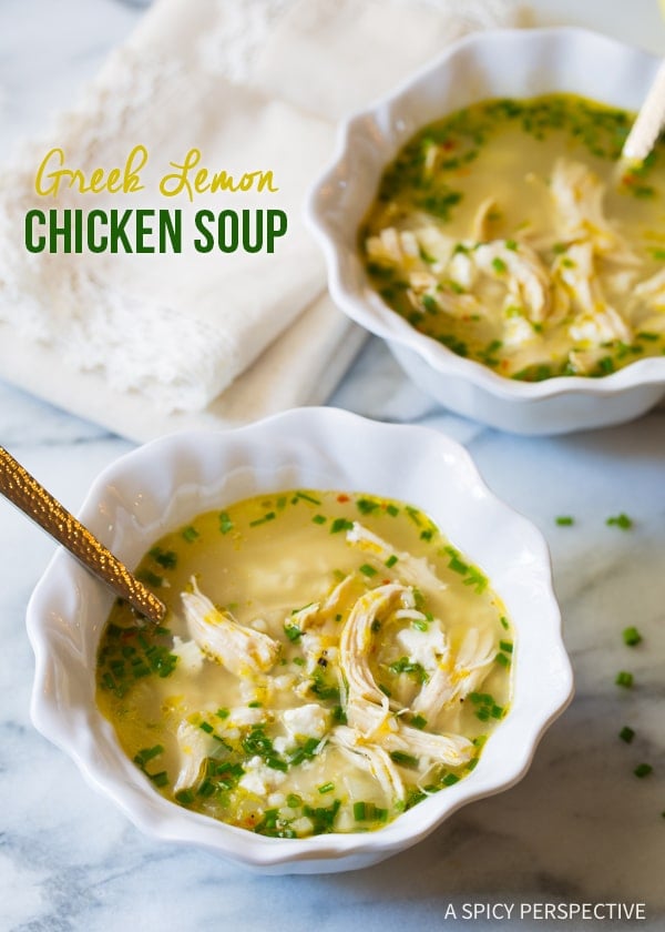 Chicken Soup #ASpicyPerspective Two bowls of Greek lemon chicken soup recipe on counter.