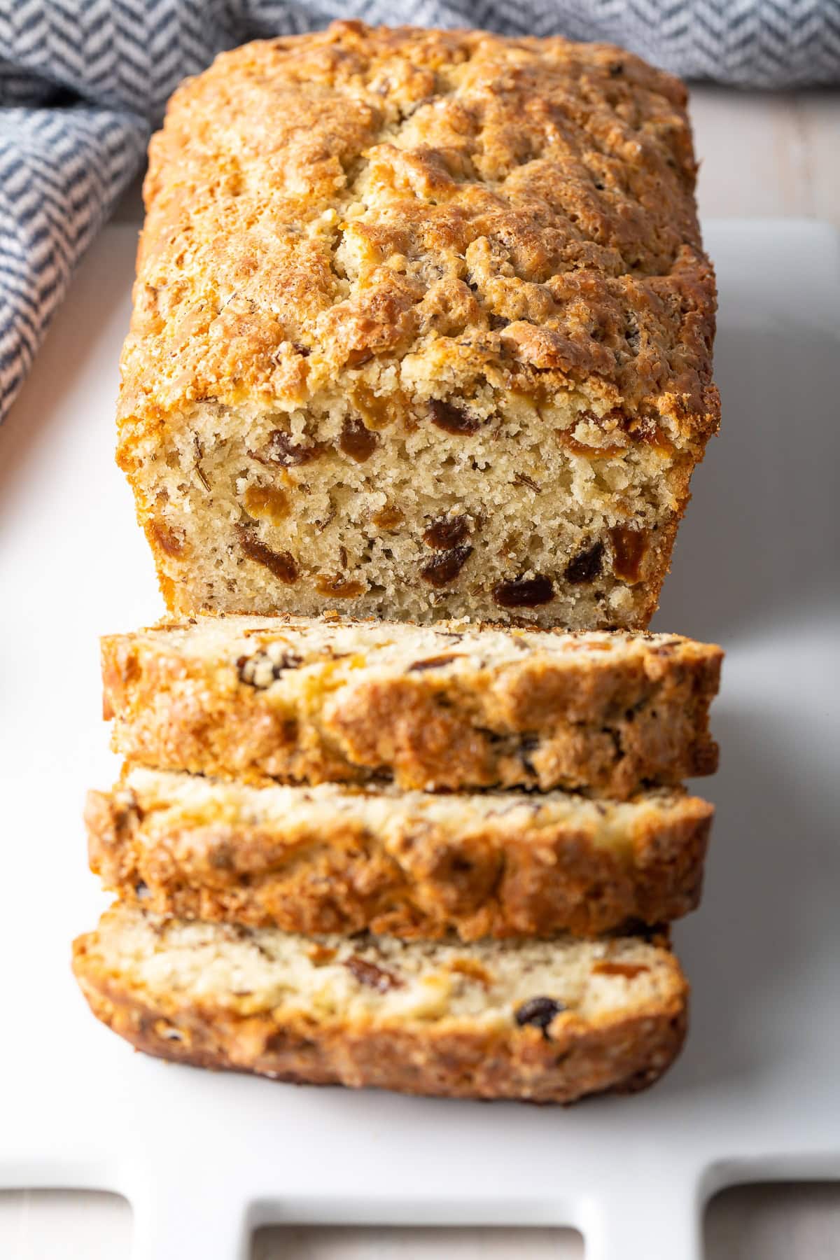 Sliced Irish soda bread on a cutting board. 