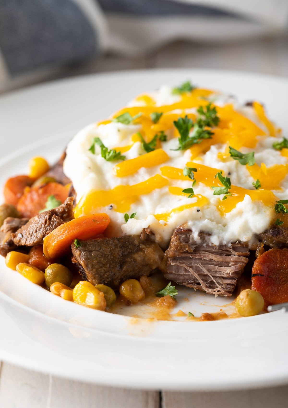 Shepherd's pie in a white plate. 