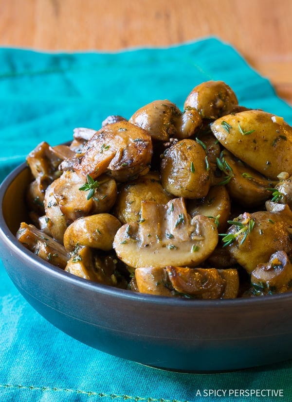 HEAVENLY Sautéed Mushroom Recipe for topping steaks or risotto on ASpicyPerspective.com